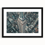 Extra large, textured abstract art print of colorful New York City skyline on a framed black mat.
