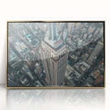 Large art print of the NYC skyline in muted gold and gray tones on a framed acrylic, suitable for modern art wall decor.