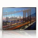 Mid-century modernist art of Manhattan skyline in muted gray tones on silver-framed acrylic.