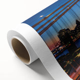 Art deco poster of Manhattan skyline in muted gray and blue tones on rolled canvas, ideal for nursery wall art.