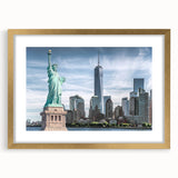 Extra large wall art featuring an abstract depiction of the Statue of Liberty in muted gold and green tones on a framed…