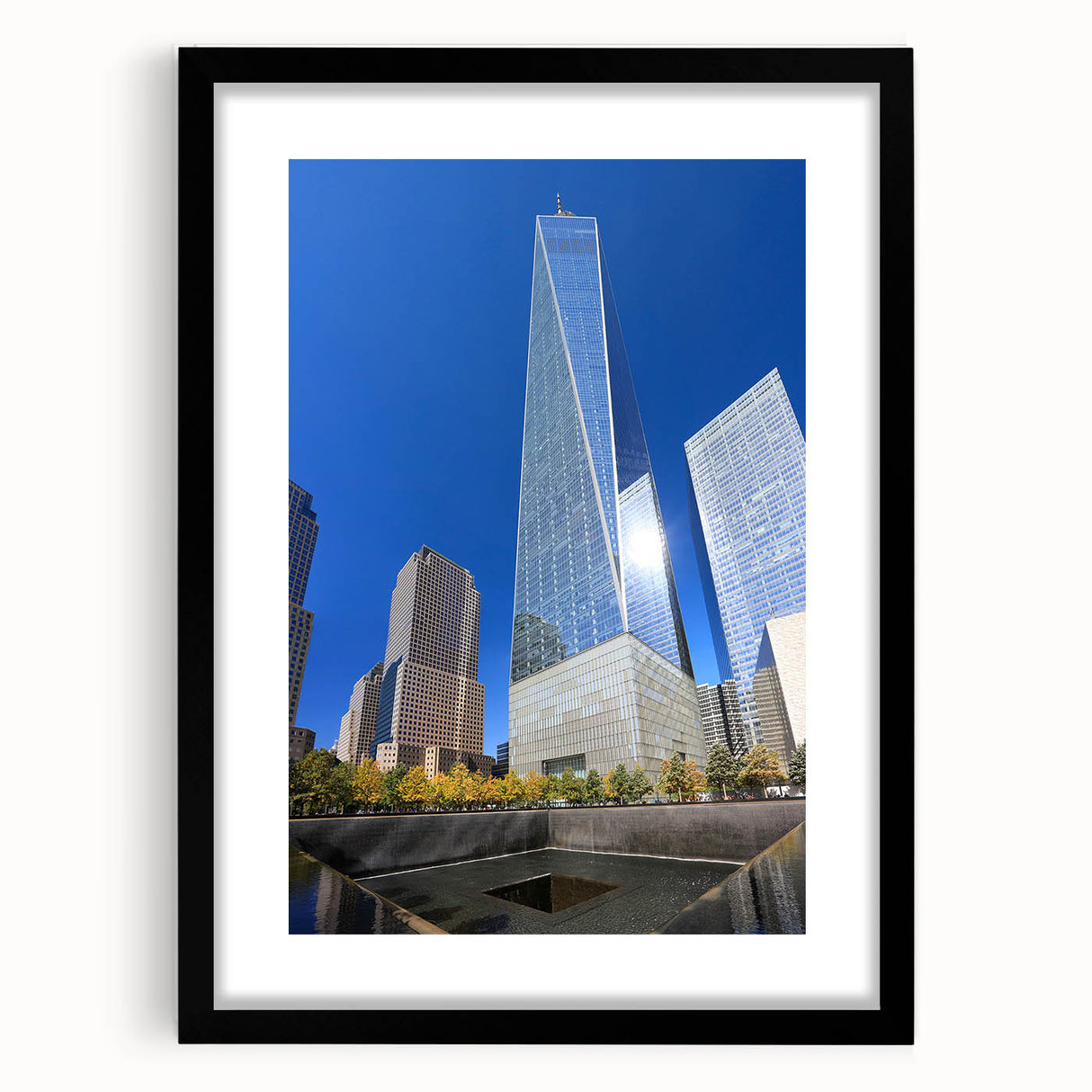 Extra large abstract art print depicting a colorful, textured depiction of the NYC skyline on a black framed canvas.