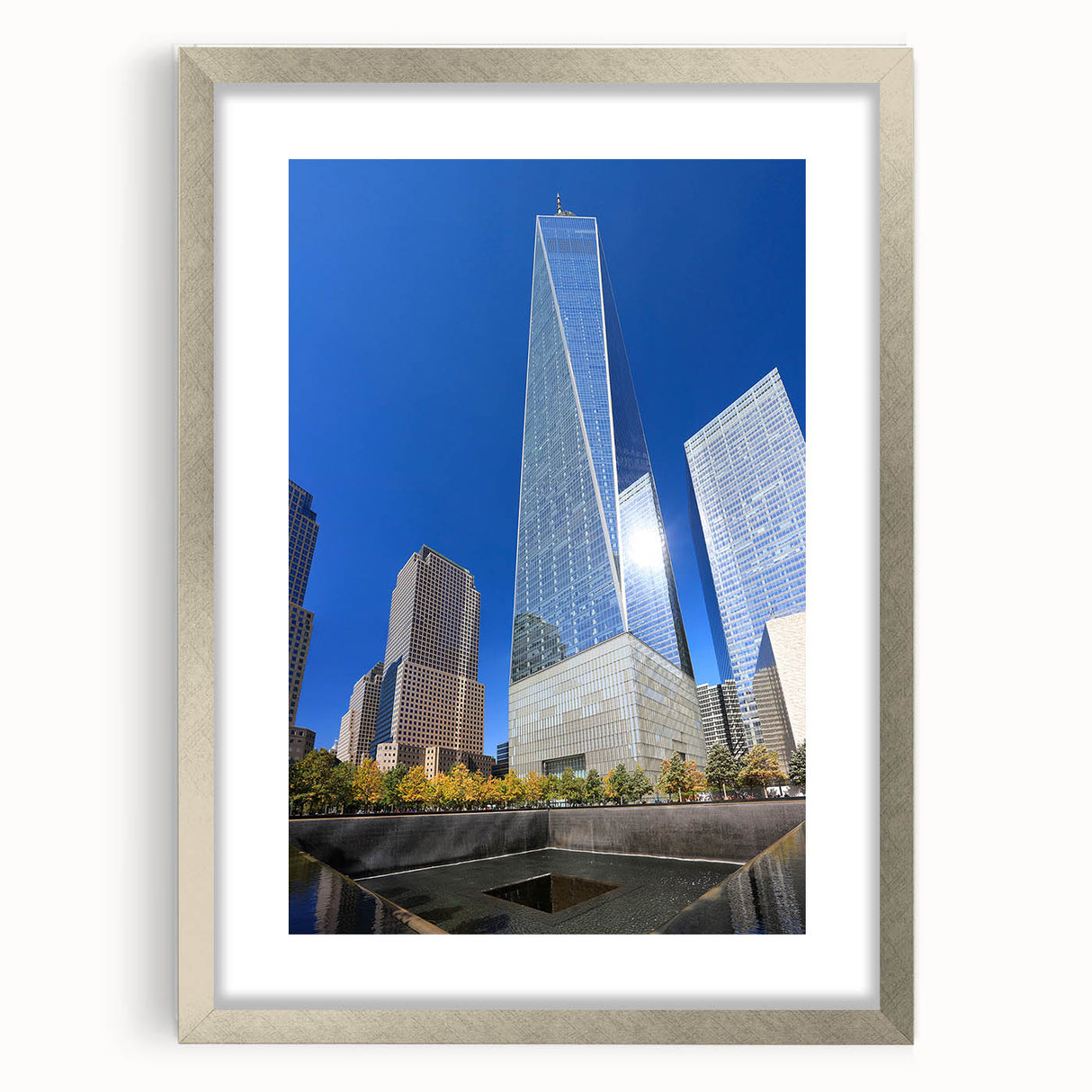 Textured art print of the NYC skyline in muted gray tones on a framed silver mat, ideal for bedroom art.