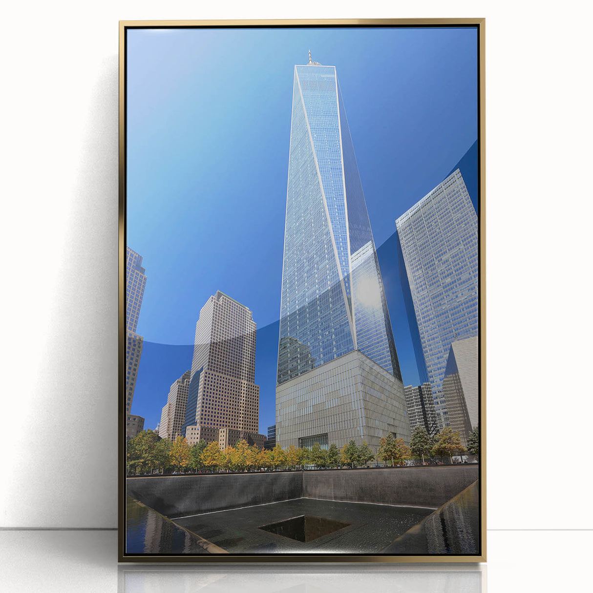 Acrylic print of NYC skyline featuring Trade Center, in gold and blue tones, ideal for modern art wall decor.