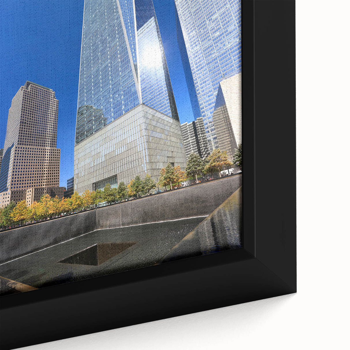 Extra large framed canvas of the NYC skyline in black with colorful, textured highlights, suitable for living room decor.