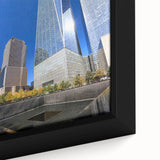 Extra large framed canvas of the NYC skyline in black with colorful, textured highlights, suitable for living room decor.