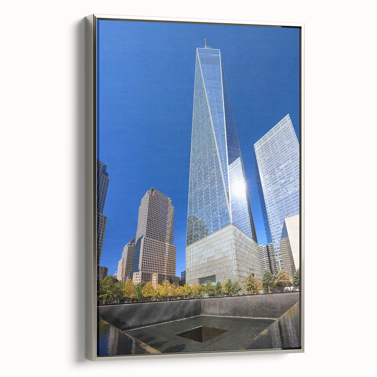 Framed canvas featuring a vintage-style New York City skyline in black with colorful accents, ideal for office decor.