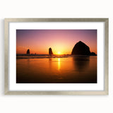 Textured art print of Cannon Beach, Oregon, in muted gray and blue tones on a framed canvas, ideal for bedroom art.
