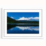 Abstract art print of Mount Hood in Oregon, featuring muted earth tones on a framed white mat, ideal for dining room decor.