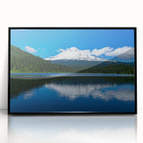 Large abstract wall art depicting Mount Hood, Oregon, in muted gray and blue tones on a black framed acrylic print.