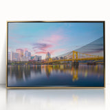 Framed acrylic print of Pittsburgh skyline in gold and black tones, suitable for modern art wall decor.