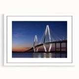 Abstract art print of Charleston scenery in muted watercolor tones on a white framed mat, suitable for dining room decor.