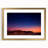 Extra large abstract art print of South Dakota Badlands in textured gold frame, ideal for living room decor.