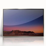 Mid-century modernist art depicting South Dakota Badlands in muted earth tones on a silver-framed acrylic print.