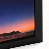 Close-up of a textured black wall art depicting South Dakota Badlands on a framed canvas, featuring vibrant colors.