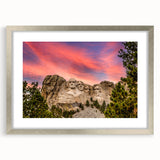 Mid-century modernist art of Mt. Rushmore in muted earth tones on a framed poster, suitable for modern art wall decor.