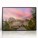 Colorful art print of Mt. Rushmore in vibrant hues on a large framed acrylic, suitable for living room decor.