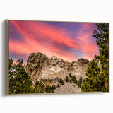 Framed canvas of Mt. Rushmore in vintage poster style with muted earth tones, ideal for bedroom wall art.