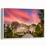 Vintage poster art of Mt. Rushmore in muted earth tones on a framed canvas, suitable for living room decor.