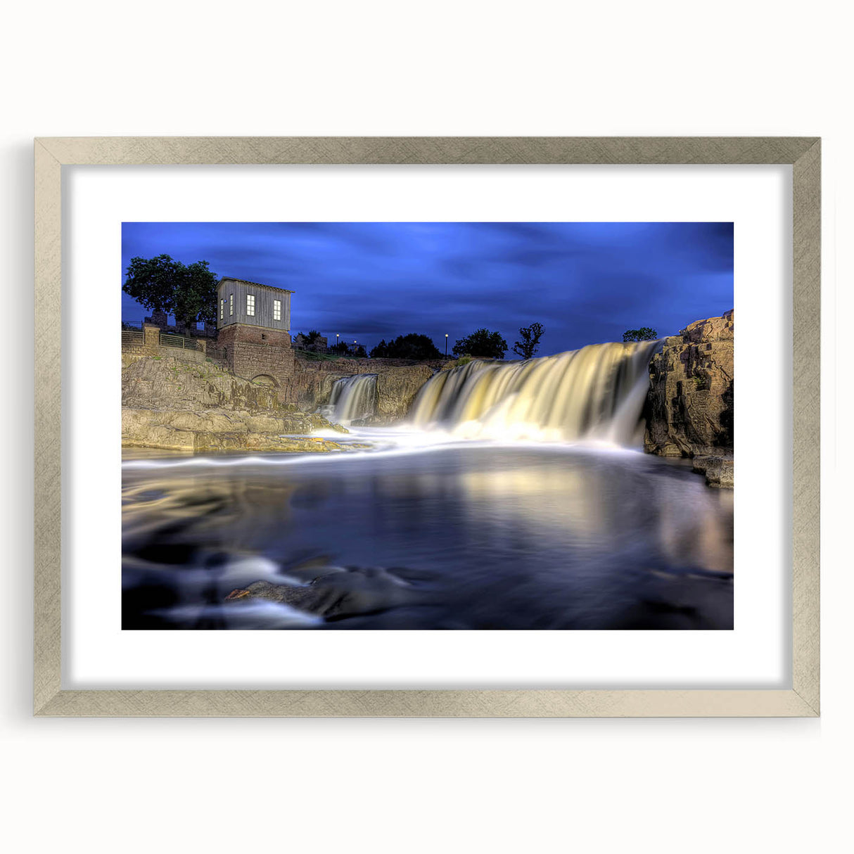 Textured art print of abstract South Dakota scenery in silver frame, using cool gray and blue tones, ideal for bedroom art.