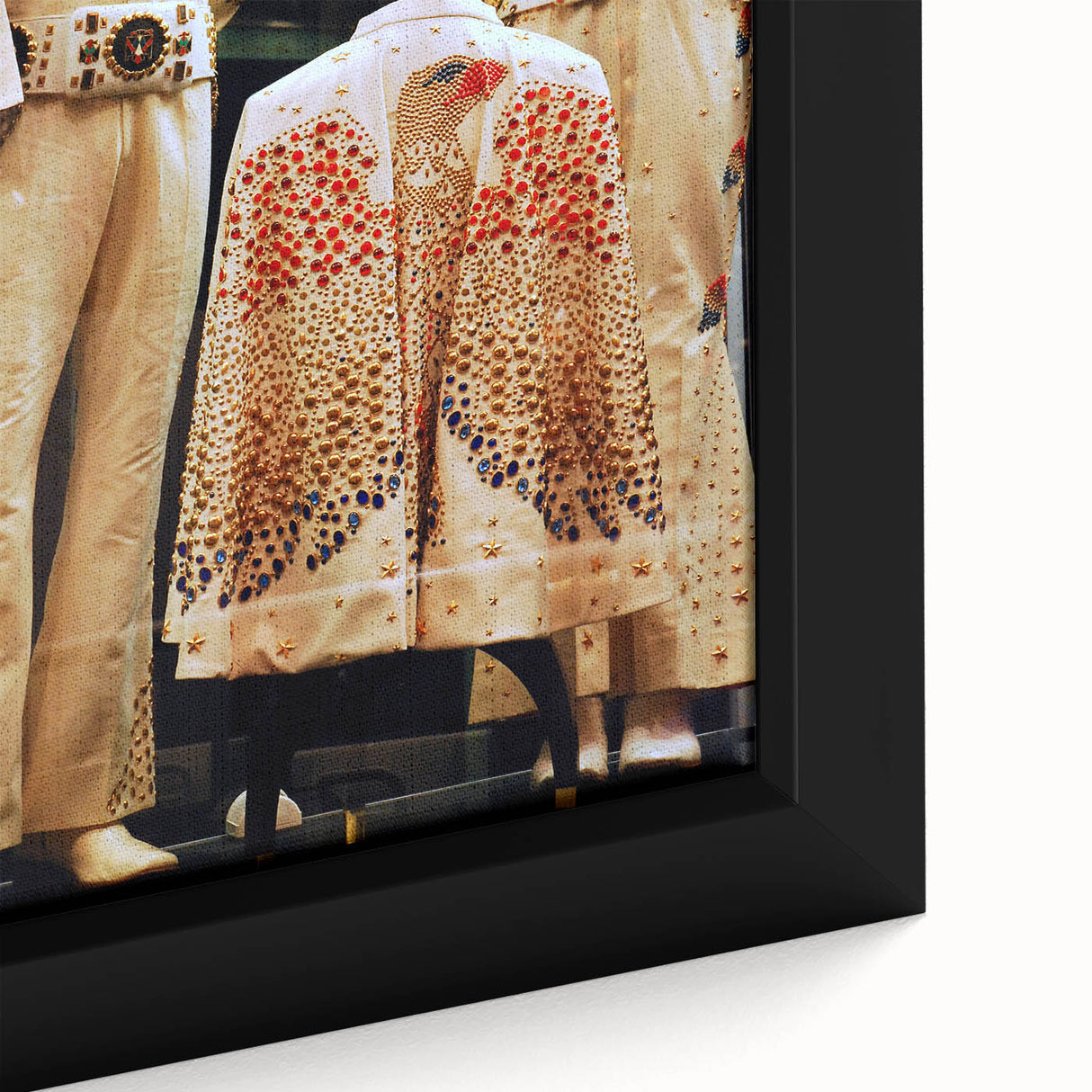 Close-up of a textured black wall art depicting Memphis scenery in vibrant colors on a framed canvas.