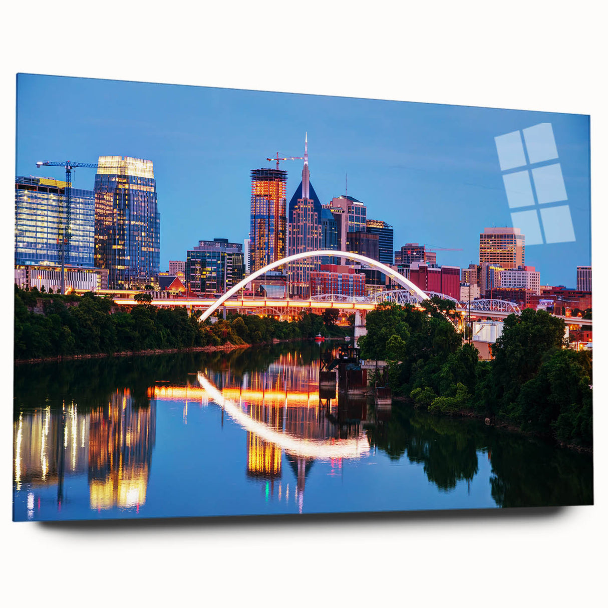 Large abstract wall art of Nashville skyline in muted blue and gray tones on acrylic glass.