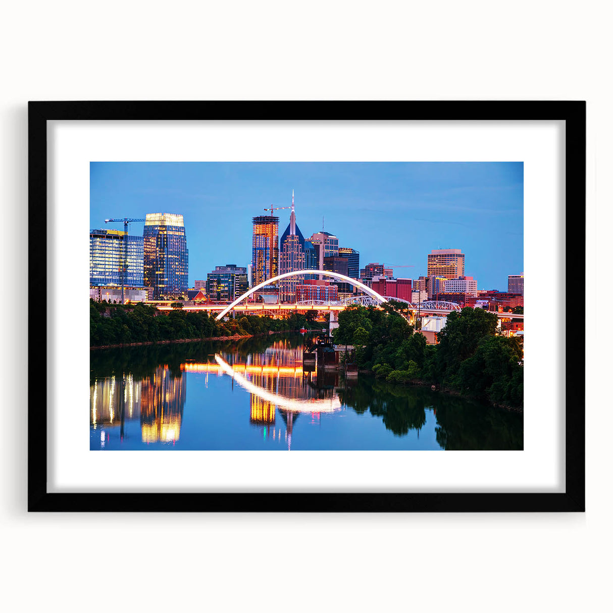 Extra large abstract art print of Nashville skyline in vibrant colors on textured canvas, framed in black.