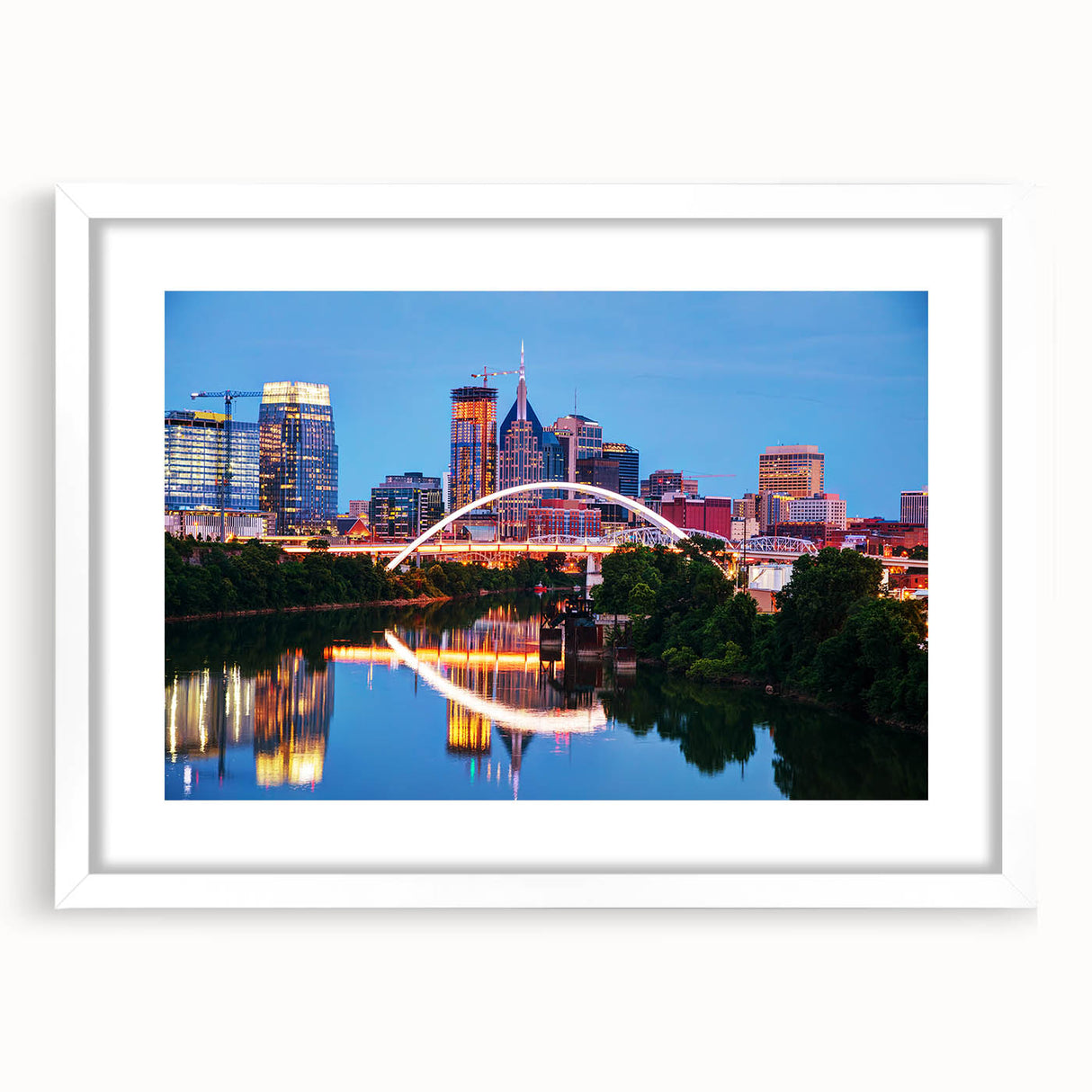 Abstract art print of Nashville skyline in muted gray and blue tones on a white framed canvas, ideal for dining room decor.