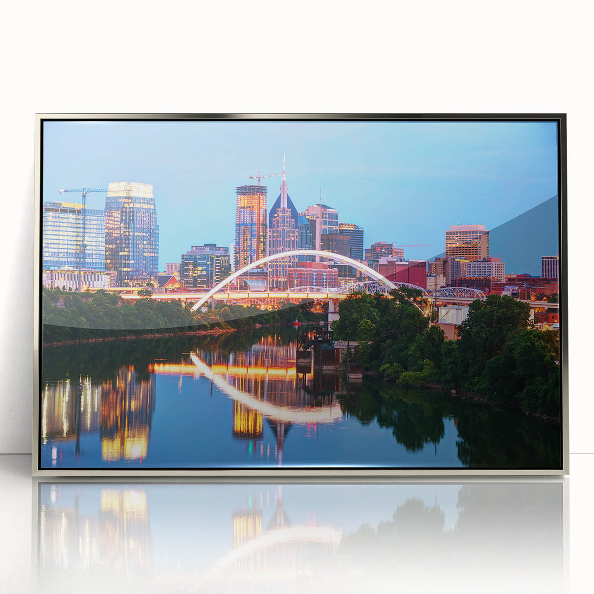 Mid-century modernist art depicting Nashville skyline in muted gray and blue tones, acrylic print framed in silver.