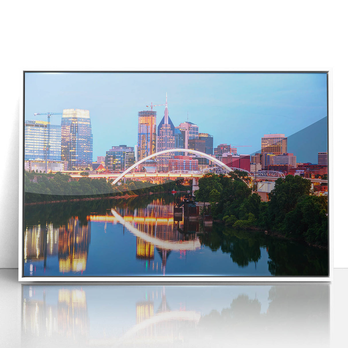Acrylic print of Nashville skyline in muted colors, framed in white, ideal for modern art wall decor.