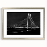 Textured art print of Dallas skyline in muted gray tones on a silver-framed canvas, suitable for bedroom decor.