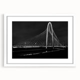 Abstract art print of Dallas skyline in muted gray and blue tones on a framed white canvas, suitable for dining room decor.