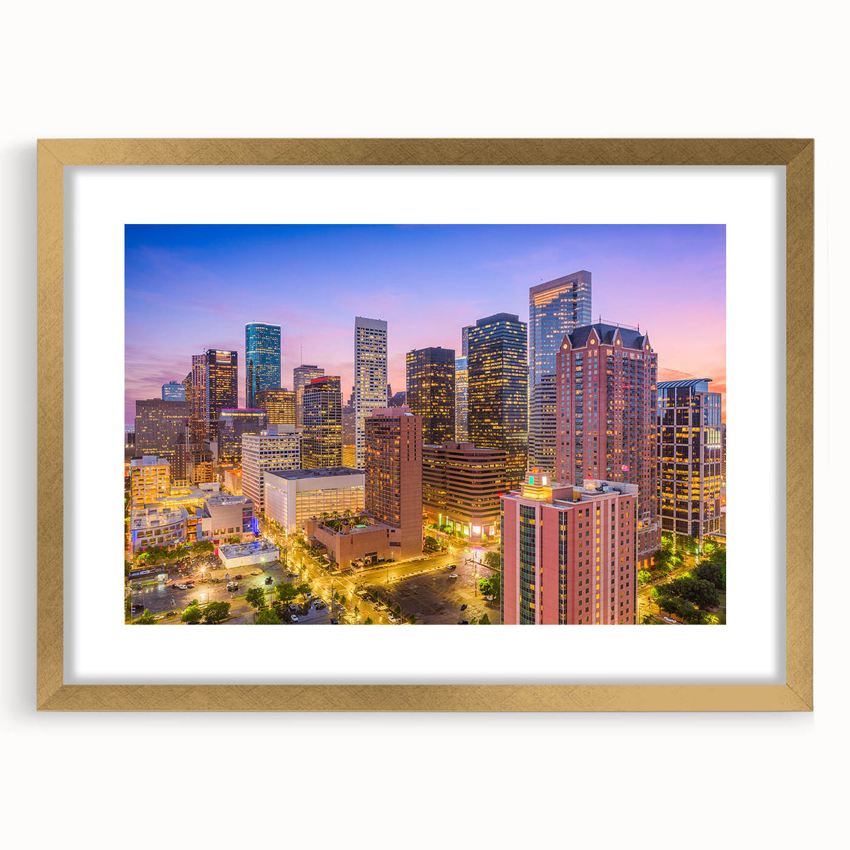 Extra large abstract art print of Houston skyline in muted gold and gray tones, framed with mat.