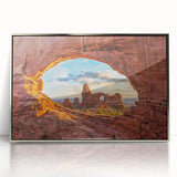 Mid-century modernist art depicting Arches National Park in earthy tones on a silver-framed acrylic print.