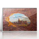 Art deco style poster featuring the Arches National Park in Utah, displayed in a white acrylic frame.