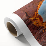 Art deco style poster of Arches National Park in Utah, featuring earthy red and orange tones on rolled canvas.