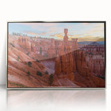 Mid-century modernist art depicting Bryce Canyon in earthy tones on a silver-framed acrylic print.