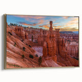 Framed canvas featuring a vintage-style landscape painting of Bryce Canyon in muted earth tones, ideal for bedroom wall art.