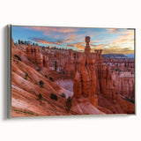 Framed canvas landscape art painting depicting Bryce Canyon in vibrant orange and red hues.