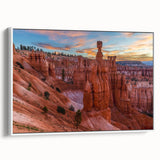 Vintage poster art of Bryce Canyon in vibrant orange and red tones on a large framed canvas, ideal for living room decor.