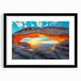 Colorful abstract art print of Utah's Canyonlands on textured canvas, framed in black, suitable for large living room walls.