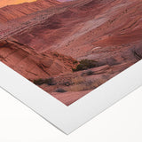 Art deco poster depicting Utah's Capitol Reef in muted earth tones on a rolled canvas, suitable for dining room decor.