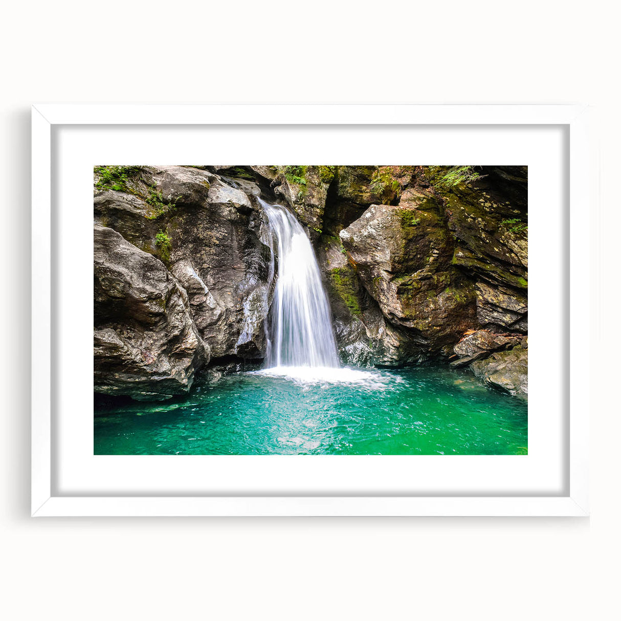 Abstract art print of Vermont scenery in muted green and blue tones, framed in white, ideal for dining room decor.