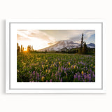 Abstract art print of Mount Rainier in muted blue and gray tones on a white framed poster.