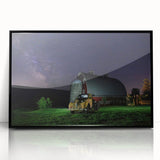 Large abstract wall art depicting the rolling hills of Palouse, USA, in muted green and brown tones, framed in black acrylic.