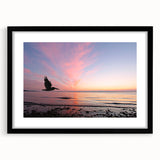 Extra large abstract art print of Seattle skyline in vibrant colors on a textured canvas, framed in black.