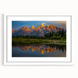 Abstract art print of Wyoming's Grand Tetons in muted earth tones on a framed white mat, ideal for dining room decor.