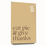 Large abstract wall art depicting autumnal trees in warm orange and red tones on acrylic glass.