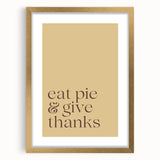 Extra large abstract art print depicting textured fall foliage in warm gold and orange hues, framed in gold.