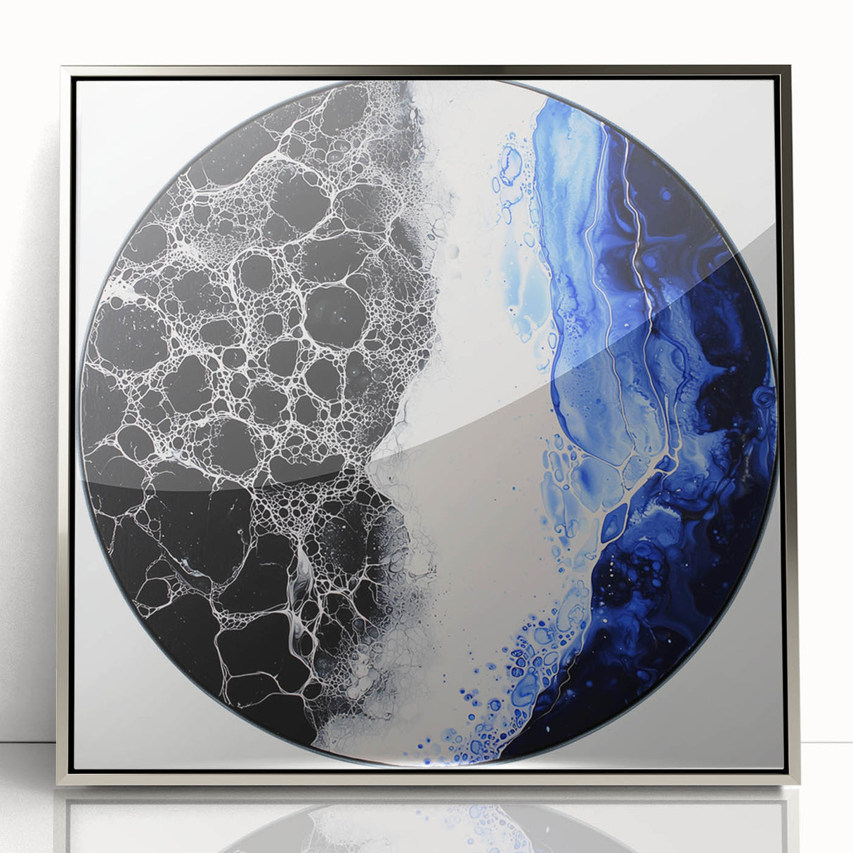 Framed acrylic artwork showcasing an abstract geometric design in silver tones, perfect for modern home decor. The piece features sharp angles and a sleek finish, enhancing contemporary interiors. Ideal for art enthusiasts looking to elevate their space.